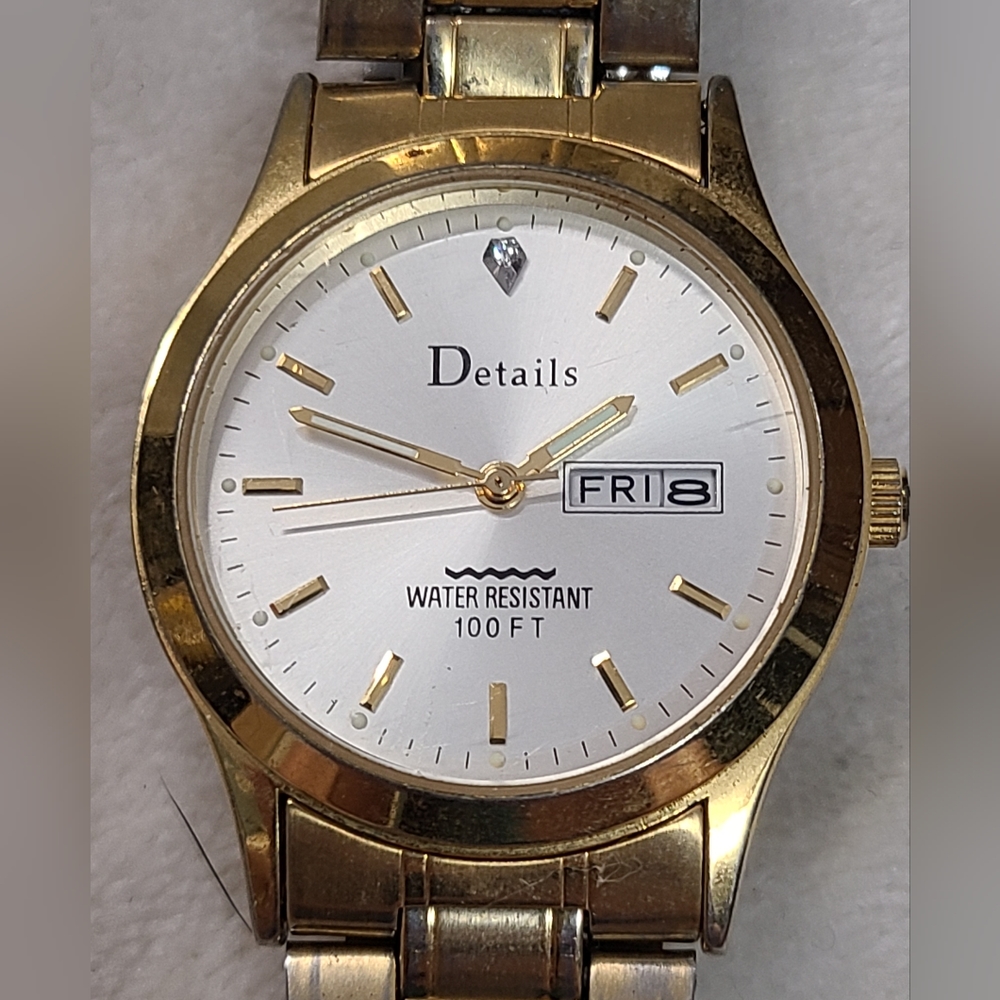 Details Women's Gold Tone Watch